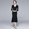 Designer de mode Femmes Automne Hiver Élégant Pull Robe Femme Tricoté Parti Robe Lady Noir Casual Midi Robes Robes 210525