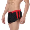 Pantalones cortos deportivos atractivos auténticos para hombres Ropa interior para el hogar Botón de calzoncillos Troncos cortos de malla Tejido de malla MEZCLA COLORES 5PCS 7063