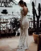 2021 Sexy Sheer Bohemian Bainha Vestidos de Noiva de Jóia Ilusão de Garganta Mangas compridas Plus Size Lace Appliqued Cristal Beads Beach Beach Boho Vestidos Bridais Varredura