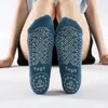 Kreativ glidande sport yoga sock silikon tryckning med gummi vuxen trampolin fot massage bomull strumpor