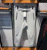 NERO GRIGIO Tech Design con cerniera laminata pantaloni da corsa pantaloni sartoriali tridimensionali da uomo in cotone spazio pantaloni sportivi 3 colori taglia asiatica M-XXL