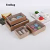 Stobag 10pcs gâteau alimentaire biscuit boîte de papier kraft avec couvercle transparent beignet fait maison boîte-cadeau de Noël pour les faveurs de fête d'événement 210602