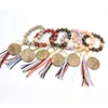 30PCS / DHL Personnalisé en cuir gland bracelet porte-clés chaînes en bois perlé bracelet bracelet sculpté perle élastique bracelets charme pendentifs bijoux WHT0228
