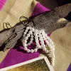 925女性の結婚式のギフトアクセサリーエレガントな模擬真珠タッセルブローチスーツピンジュエリー