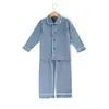 100% algodón azul marino Color sólido niños niñas ropa de dormir botón familia hermanos a juego niños Navidad volante niños pijamas 210908