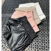 Pantaloncini da motociclista in ecopelle nera Donna Elastico a vita alta Gamba larga Moda Autunno Casual Donna Sexy Femme 210719