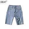 [DEAT] été mode pantalons courts taille haute couleur unie trou irrégulier personnalité femmes Denim Shorts 13C940 210527