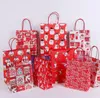 Grande regalo per la festa di Natale Sacchetti di carta Kraft Creativo rosso Simpatico cartone animato Confezione natalizia Tote Bag Regali per festival Confezione-borsa SN3043