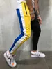Zogaa 2021 Nieuwe broek herenmode hip-hop stijl broek kleur-geblokkeerde veter-up mannen slanke bodems individuele straatkleding S-3XL Y0811