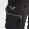 Jeans para hombre Bolsos de diseñador rasgados Más monos de moda Petos Pantalones cargo de mezclilla Pantalones de motocicleta elásticos delgados informales de oficina 5795008