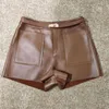 kvinnor solid kort mini kvinnlig chic bana mode koreanska höga midja streetwear fårskinn höst vinter shorts 210611