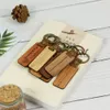 Lege houten sleutelhanger Aangepast logo Draagbare riemen Lederen sleutelhanger Promotie Souvenir Cadeau Walnoot Esdoornhout Lasergravure sleutelhangers