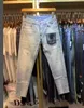 2021 أزياء جينز نسائية للربيع والصيف / جينز ممزق عالي الجودة بتصميم علامة تجارية / جينز غير رسمي بقصة ضيقة مقاس 26-30