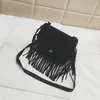 Bolsas para bebês Bolsas de mão com borla de leopardo para crianças Bolsas de ombro da moda para meninas Bolsas transversais para todos os jogos Carteira para lanches doces para crianças C1101 46 Y