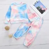 Herfst ins tie dye kids kleding jongens meisjes lange mouw pocket top + broek 2 stks / sets boutique kinderen outfits m2688 351 y2