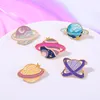 Européen Colorful Space Star Planet Series Brooch Pin Unisexe Women Universe Univers en alliage Émail Badge Badge Business Business Suit Clot5599310