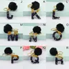 Black Pompom Carta Chaveiro Inglês Alfabeto Chave Anel Glitter Gradiente Resina Espelho de Carro Espelho Mulheres Handbag Charms Llavero