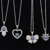 Turks blauw kwaad ogen kettingen vrouwen titanium stalen kroon sleutel bloem dier hart iced out hangers sieraden mode diamant ketting geschenken