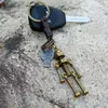 Retro Bronze Robot Keychain Movable Screw Bolt Robot Keyring Bag Hangs Rings Key Holders Fashion Jewelry Will and Sandy