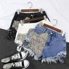 Jeans corti a vita alta strappati con rivetti a nappa vintage da donna di marca di moda da donna Pantaloncini di jeans da donna sexy punk 210714