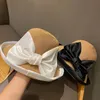 Breda randen hattar vintage vår sommar papper gräs lapptäck tyg band båge för kvinnor lady sun hatt strand casual chapeu fedora delm22