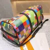 Mens resor bagage duffel väska kvinnor luxurys designers väskor 2021 ryggsäck för män mode resväska färgglada rutnät bär på resväskor damen