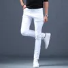 Designer moda branco jeans marca elástica masculina calças jeans casuais slim fit estendido calças magras