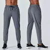 herrbyxor ledig lös snabbtorkande långbyxa skarvning löpning gym jogger sport yoga slimmade träningsbyxor joggingbyxfickor botten elastisk midja herr leggings