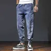 Herenmode broek elastische band overgewicht grote maat jeans cowboy broek mannelijke modieuze patchwork streetwear plus size man 2111104