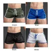 Men Shorts Casual Gym Fitness Training Shorts Sexy Mesh Breathable Sports Beach Trunks Male Clothing New Comfortable Y200901