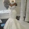 Dubai sjöjungfru bröllopsklänningar brudklänningar hög hals illusion spetsar applikationer kristallpärlor plus storlek tyll formell med blommor öppna rygghylsor