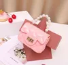 1 Kinderhandtasche Kinderhandtaschen Top-Qualität Babytaschen Ringer Jelly Wrap Damentasche Damen Geldbörse Fabrikgroßhandel 2