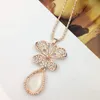 Vrouwen Trui Keten Kettingen Hangers Nieuwe Sieraden Rose Bloem Kruis Cat Eye Edelsteen Oostenrijkse Kristal Mode Strass Hanger Ketting