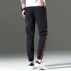 Pantaloni da uomo 2021 Summer Tide Brand Style Pantaloni casual stampati Versione coreana Sports Tied Thin Men Hip Hop White