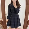 韓国のファッション女性のシャツのドレス
