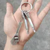 Keychains Silver Mini Multifunktion Skiftnyckel Keyring Metal Reparation Portable Hand Tool Jaw Spanner Home Justerbara nyckelkedjor Universal Miri22