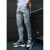 Pantaloni sportivi skinny color block da uomo Pantaloni sportivi a matita da strada di tendenza hip-hop di tendenza occidentale di moda Pantaloni casual da skateboard maschile primaverili