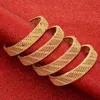 Bangle 4st Ethiopian African Dubai Gold Color Hollow Can Open Bangles For Women Män flickor Kvinnliga bröllop smycken