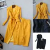 Conjunto de falda de traje de temperamento para mujer de dos piezas Otoño e invierno de alta calidad amarillo chaqueta de abrigo larga para mujer Slim negro 210527