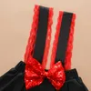 夏の赤いスパンコールの装飾トップ+ブラックストラップスカートちょう結び女の子セット子供のスーツの衣服セットベビー服210528