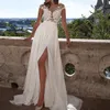 Lato Szyfonowa Suknia Ślubna Seksowna Seksowna Side Long Boho Beach Suknie Ślubne Illusion Bodice Koronki Aplikacje Krótki Rękaw Czeski Bride Wedding Suknie Ślubne Białe