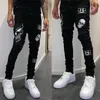Mężczyźni Slim Biker Jeans Stretch Black Myted Neutral Street Cienkie Dżinsy Spodnie Czaszka Drukowana Design Fit Przytulny Ołówek Spodnie 210716