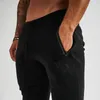 مصمم اللياقة البدنية Jogger sweatpants الذكور كمال الاجسام اللياقة السراويل الرجال القطن أزياء متعددة الجيوب تدريب كمال الاجسام الركض السراويل