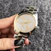 24% DI SCONTO orologio Orologio da donna, stile lettere grandi, cinturino in acciaio, metallo, quarzo, con orologio completo di lusso 6990