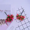 12pcs/bundel kunstbloemen mini zijden rozen diy krans geschenken kerstdecor voor thuis bruiloft bruids broche nep jllvza