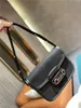 Verkskvalitet äkta läder kvinnors män tote crossbodysaddle väskor lyxdesigner mylon mode shopping plånbok kamera fodral 2238