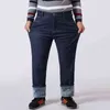 Плюс размер 42 44 48 50 52 мужские зимние теплые джинсы бизнес случайные синие черные прямые свободные джинсовые брюки мужские брюки 211108