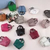 Baby-Umhängetaschen, niedliche Taschen, Designer-Kinderhandtaschen, Airpods-Hülle, Dekorationen, Geschenk-Handtasche, Modell, Kinder-Geldbörsen, Geschenk, Mädchen-Umhängetasche, Barbie-Puppe. Ein Set mit 13 Farben