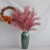 装飾的な花の花輪100cmの造られたピンクリードの草の結婚式の装飾小道具長い花の配置材料El Christmas Home de