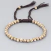 Braccialetti con ciondoli Buddista tibetano regolabile Filo di cotone intrecciato a mano Perline di rame Bracciale con nodi fortunati Gioielli da donna in ottone